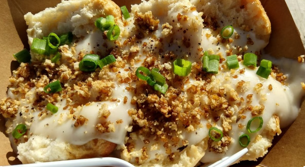 Biscuits + Groovy signature dish – Austin biscuits and gravy with sausage and chives