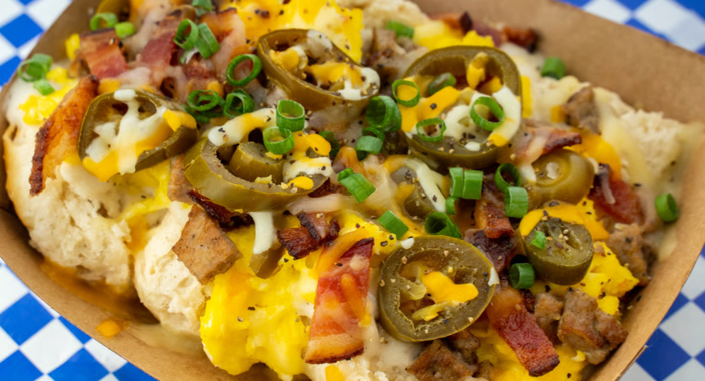 The Gloria biscuits and gravy – Austin breakfast dish with sausage, eggs, jalapeños, and cheese from Biscuits + Groovy