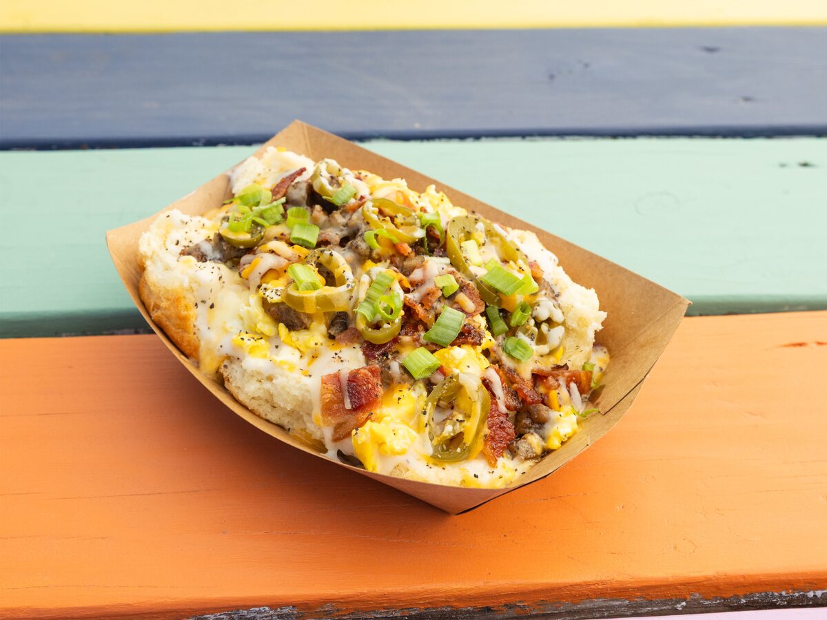 The Gloria biscuits and gravy Austin breakfast dish with sausage, eggs, jalapenos, and cheese from Biscuits + Groovy
