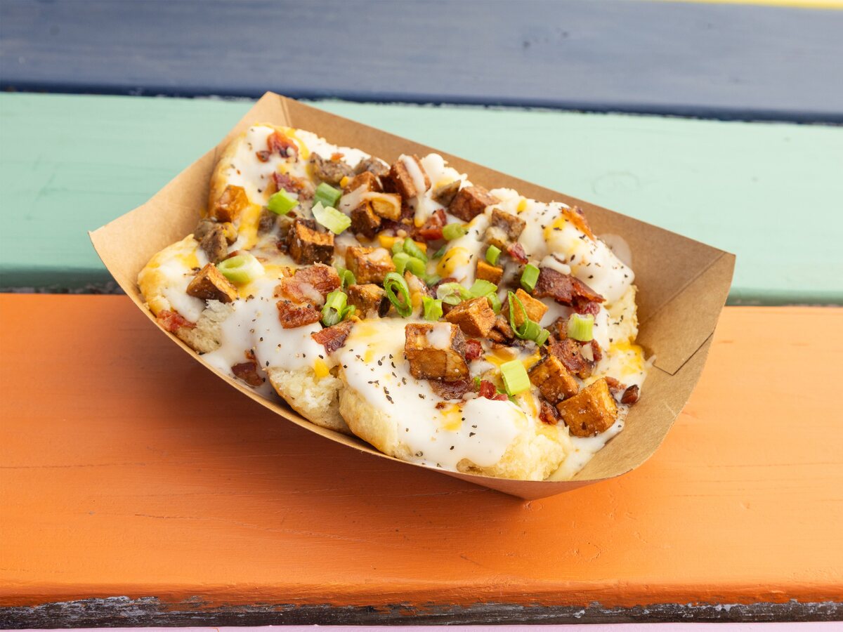 The Johnny biscuits and gravy Austin breakfast with sausage, bacon, potatoes, and cheese from Biscuits + Groovy